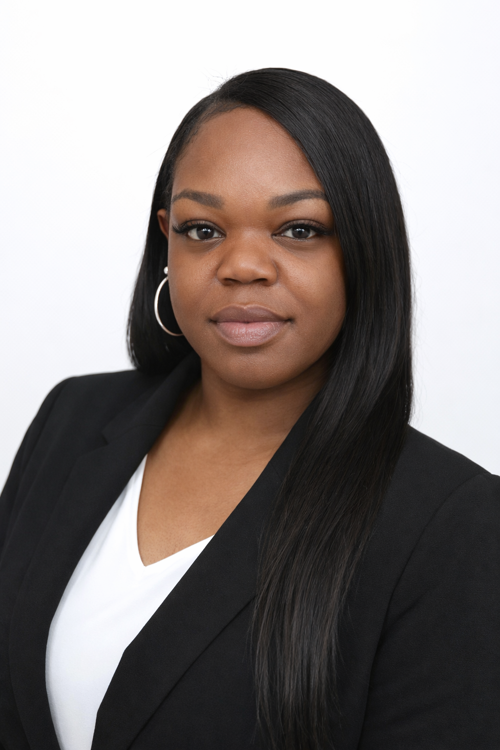 Caprice L. Taylor, founder of The Roaming Table Co., beside a styled grazing table